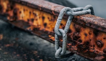 rusted steel bar and chain