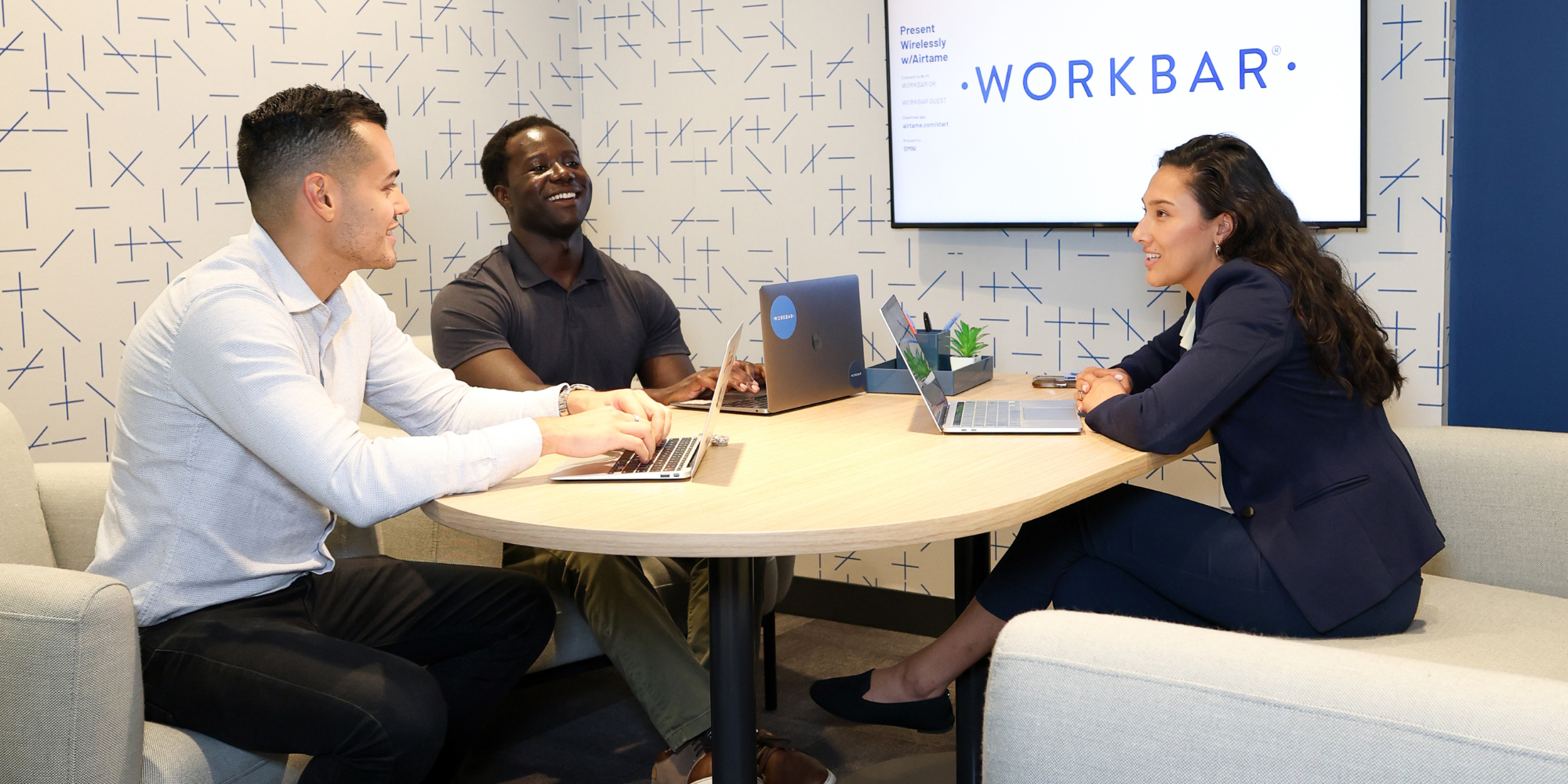 Teams working together at Workbar 